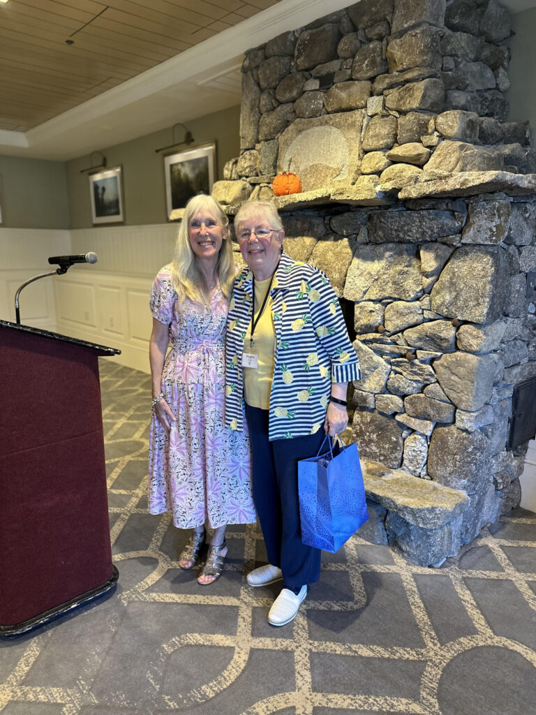 Margaret Cooper, right, wins the Mary Rice Award